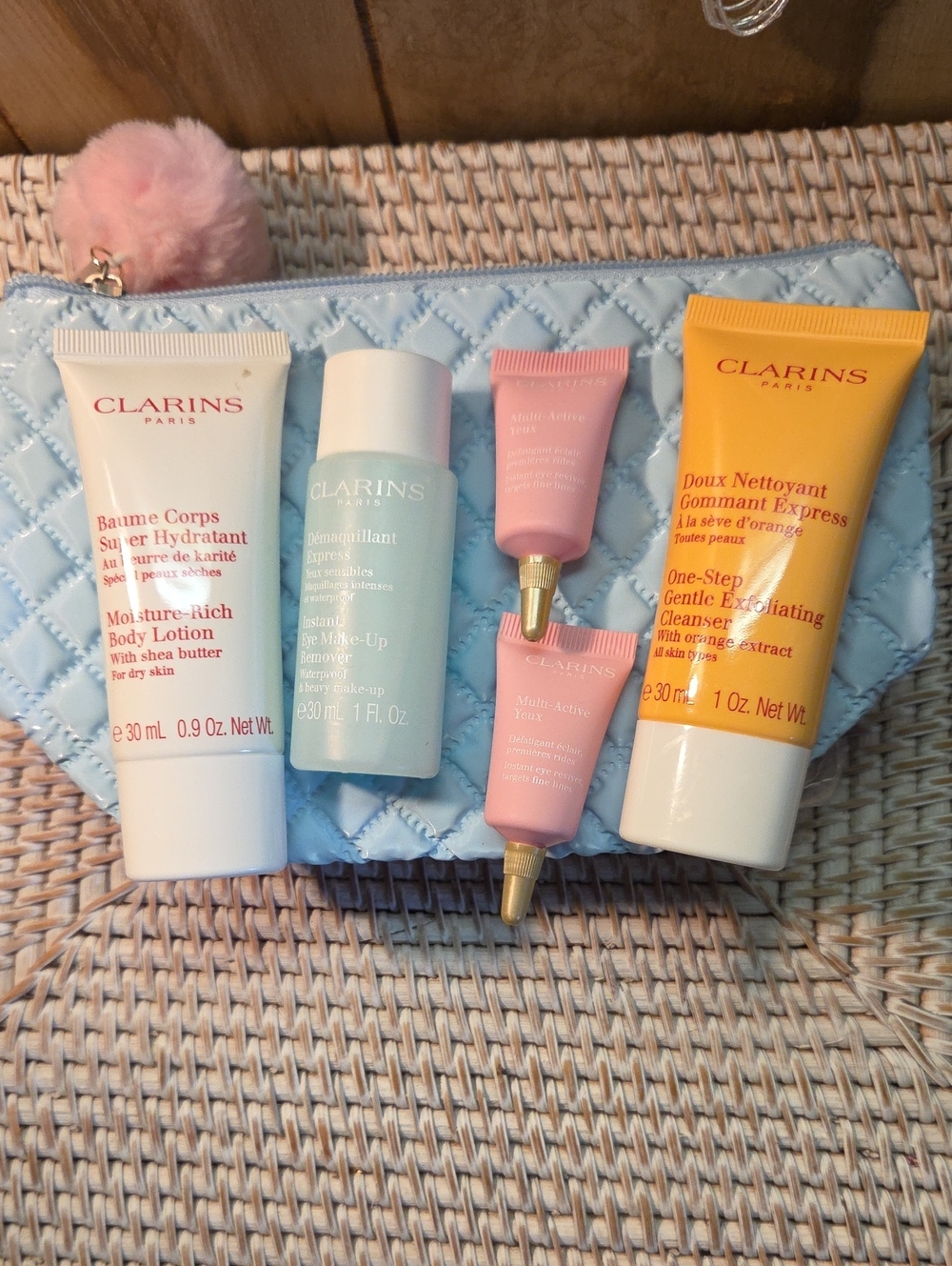 Clarins Skincare Set - Body lotion, makeup remover. Eye revive, Exflo Cleaner